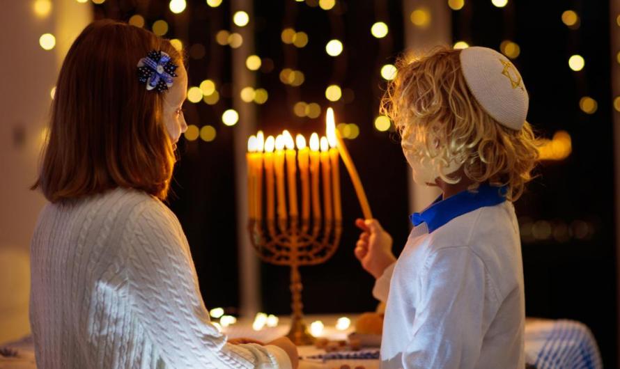 Hanukkah kids menorah lighting istock