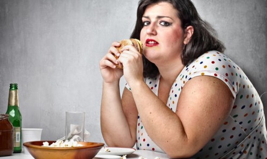 obese woman eating junk food